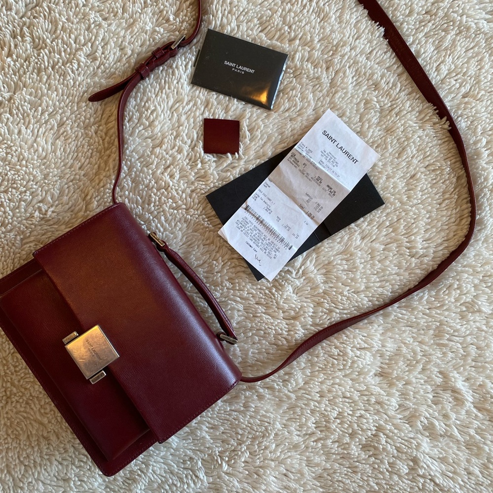Saint Laurent 
Buraundy Leather Bellechasse Satchel